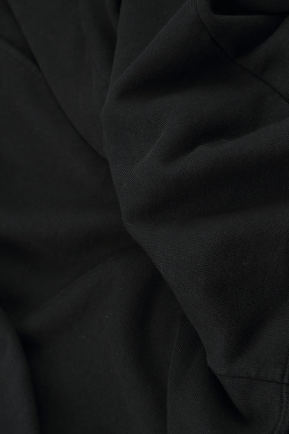Schwarze Baumwollbluse mit Rüschensaum