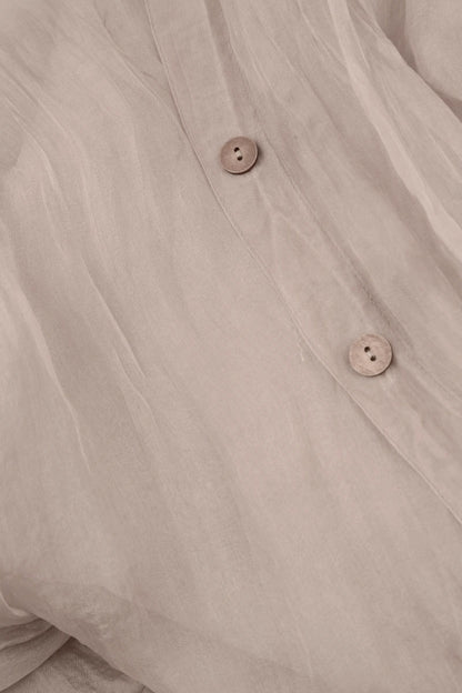 Veste boutonnée en mousseline de soie beige
