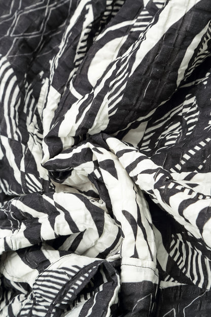 Ausgestellte Jacke aus kariertem Orbit-Leinen und Baumwolle