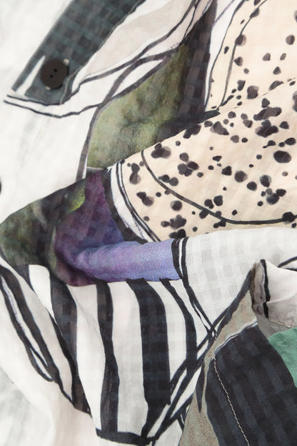 Robe en soie texturée motif galets coupe ballon