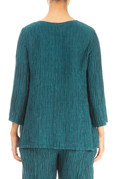 Chemisier en soie froissée à encolure cœur et motif paon