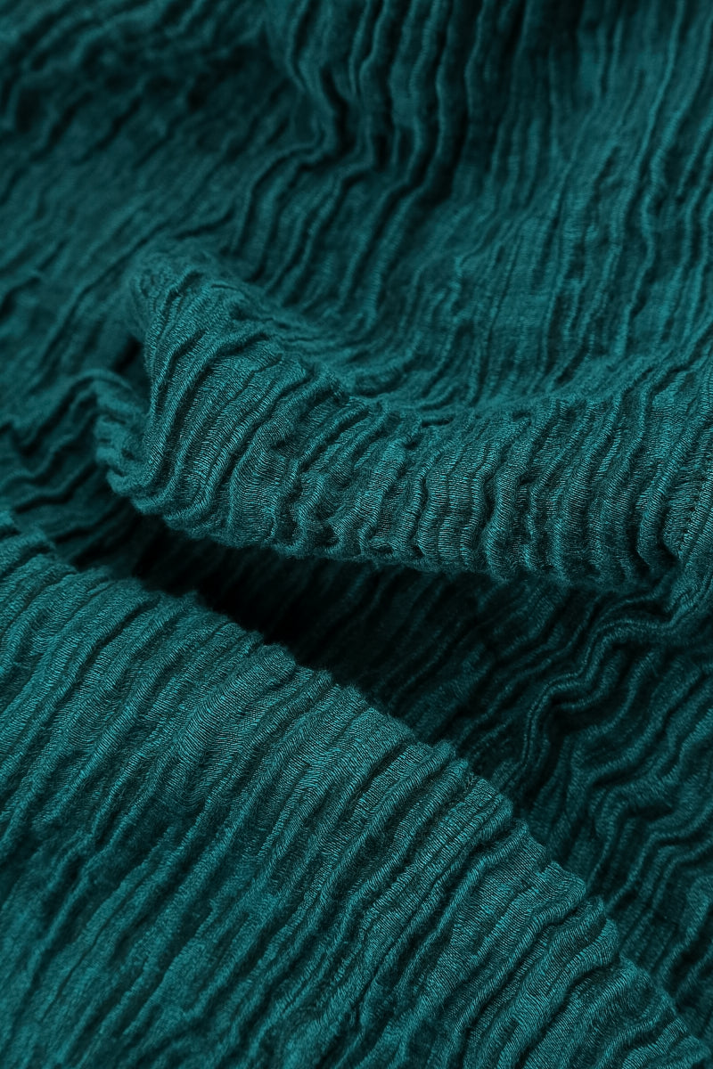 Chemisier en soie froissée à encolure cœur et motif paon