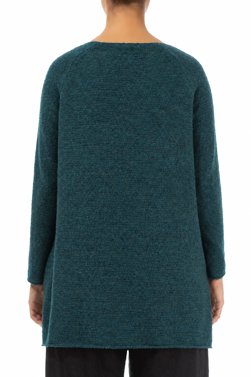Pull en laine turquoise à col en V et dos plus long
