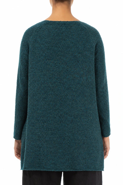 Pull en laine turquoise à col en V et dos plus long