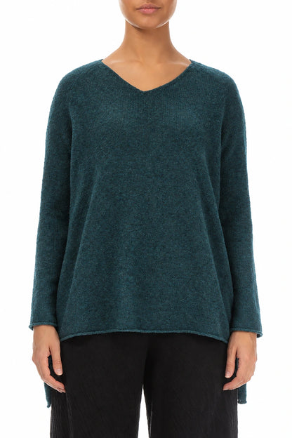 Pull en laine turquoise à col en V et dos plus long