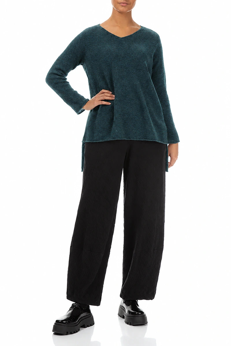 Pull en laine turquoise à col en V et dos plus long