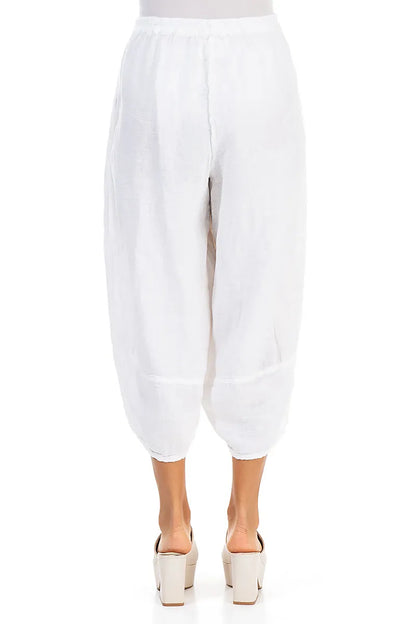 Weite, verkürzte weiße Leinenhose